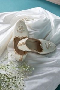 Intricate Hand Embroidered Juttis in Eri Silk