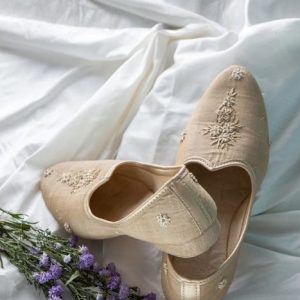 Intricate Hand-Embroidered Juttis in Fine Pressed Muga
